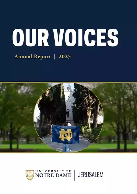 NDJ 2025 Annual Review cover. A person holds a navy blue Notre Dame flag in front of the stone building with a clock tower at the Tantur Ecumenical Institute in Jerusalem.